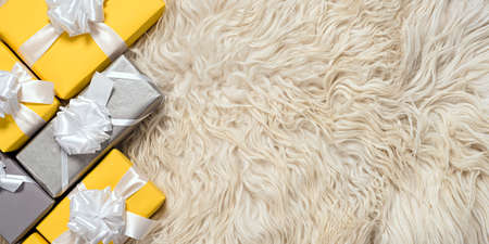 group of christmas yellow and grey gifts boxの写真素材
