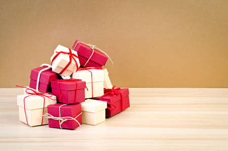 Stack of red and beige gift boxの写真素材