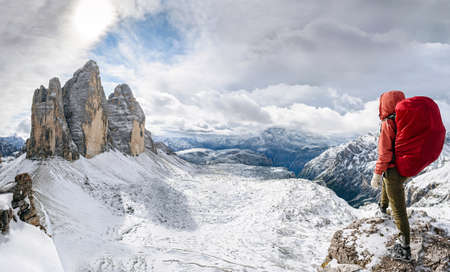 hiker in Dolomites, mountain panorama in Italyの写真素材