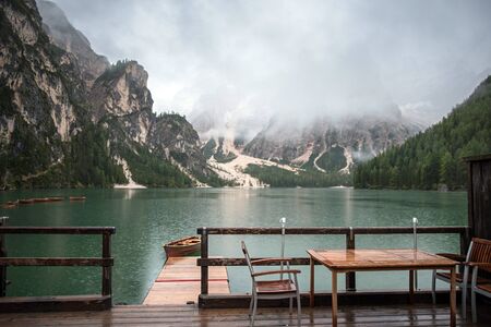 lake with boats mountainの写真素材