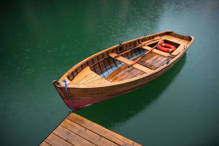 lake with boats mountainの写真素材