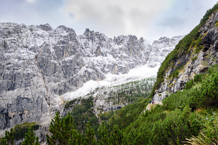 panoramic view of snowy mountain peak in winter, dolomites, italyの写真素材