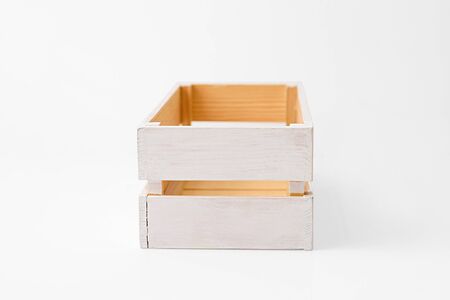 empty wood box isolated on whiteの写真素材