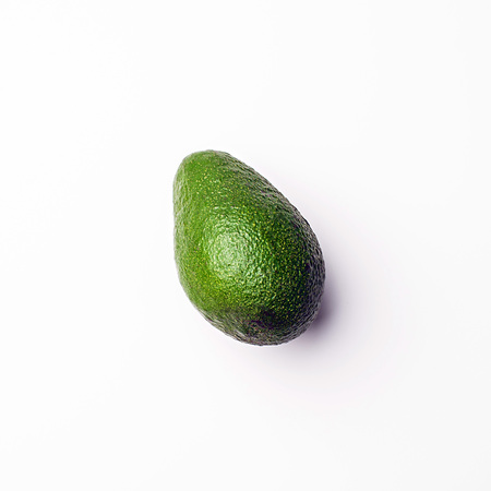 Green vegetables flat lay concept. avocado on white background, top view with empty space for text.の写真素材