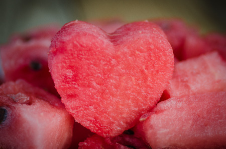 the heart of the watermelon slices of watermelon on a plateの写真素材