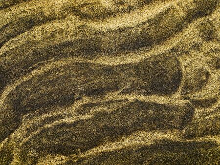 Texture of a sand surface with wave pattern