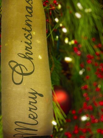 Decorated Chritsmas tree with lights and bannerの写真素材