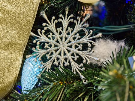 Christmas tree decorated with glitter, lights and glass balls for the Christmas and New Year celebrationsの写真素材