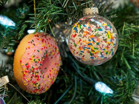 Christmas tree decorated with glitter, lights and glass balls for the Christmas and New Year celebrationsの写真素材