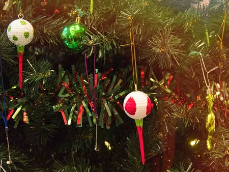 Christmas tree decorated with glitter, lights and glass balls for the Christmas and New Year celebrationsの写真素材