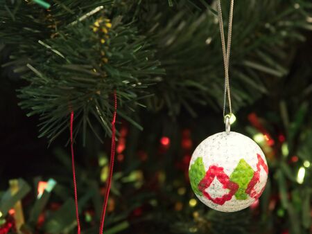 Christmas tree decorated with glitter, lights and glass balls for the Christmas and New Year celebrationsの写真素材