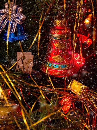 Christmas tree decorated with glitter, lights and glass balls for the Christmas and New Year celebrationsの写真素材