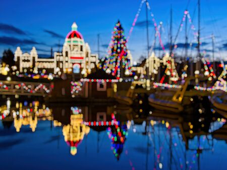 Inner Harbor in Victoria BC, Vancouver Island, Canada,decorated with festive lights during Christmas time. Intentionally blurredの写真素材