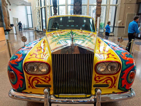 VICTORIA, BRITISH COLUMBIA, Canada - February 1, 2020. John Lennon's iconic 1965 Rolls-Royce Phantom V Touring Limousine on display in the Royal BC Museum's glass lobbyのeditorial素材