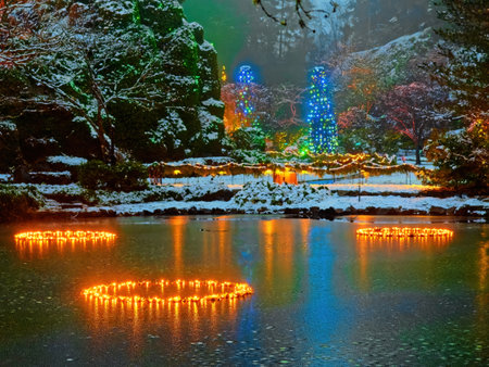 Victoria BC, Canada - December 21 2018. Festive Christmas illumination in snow-covered The Butchart Gardensのeditorial素材