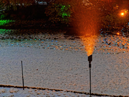 Victoria BC, Canada - December 21 2018. Festive Christmas illumination in snow-covered The Butchart Gardensのeditorial素材