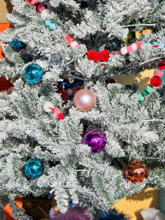 Bright colorful Christmas display of the toys and decorations in the store window