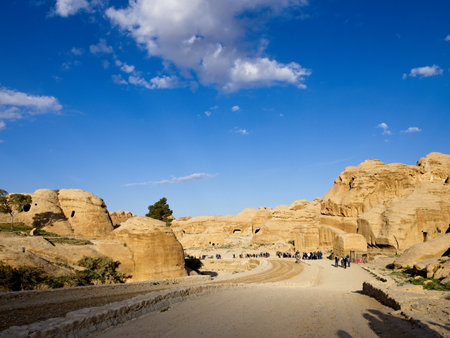 Scenic road toward entrance to ancient city Petra, Jordan, one of seven Wonders of the World