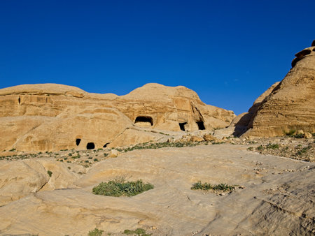 Scenic road toward entrance to ancient city Petra, Jordan, one of seven Wonders of the Worldの写真素材