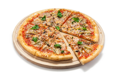 Pizza with meat on a wooden boardの写真素材