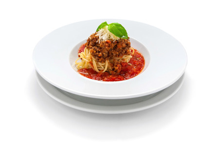 Pasta bolognese on a white plateの写真素材