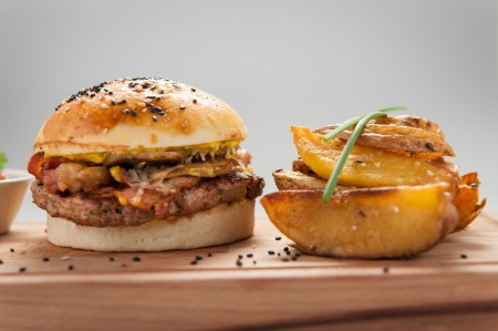 Hamburger with fried potatoesの写真素材