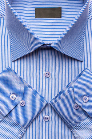Close up shots of blue striped man's shirtの写真素材
