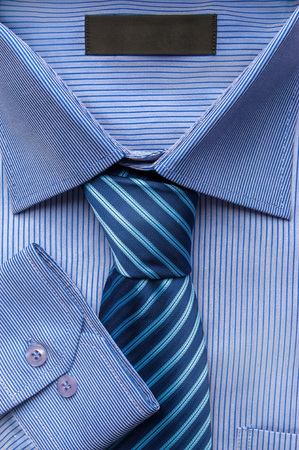 Close up shots of blue striped man's shirt with striped tieの写真素材