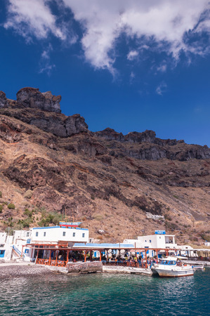 Typical greek tavern on a beach of Thirasia island near Santorini, Greece on a sunny dayのeditorial素材