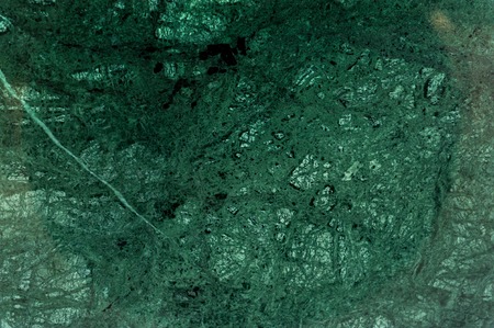 Green marble texture with lots of dark cracksの写真素材
