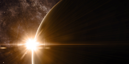 Sunrise in space with prominent sun flare and sun streaks. Golden, orange and yellow color scheme. Elements of this image furnished by NASA. 3d illustrationの写真素材