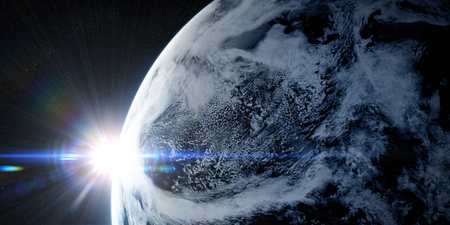 Sunrise in space with prominent sun flare and streaks. Orbital view on a planet covered in clouds from space. Planet is covered in clouds.  3d illustrationの写真素材