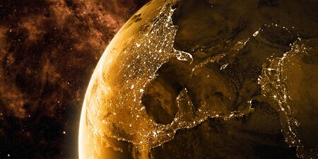 View on the night Earth with city lights. North America, Caribbean and South America region. Golden and yellow color scheme.の写真素材
