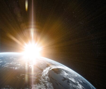 Sunrise in space with prominent sun flare and sun streaks. Orbital view on a planet covered in clouds from space. Planet is covered in clouds. Elements of this image furnished by NASA. 3d illustrationの写真素材