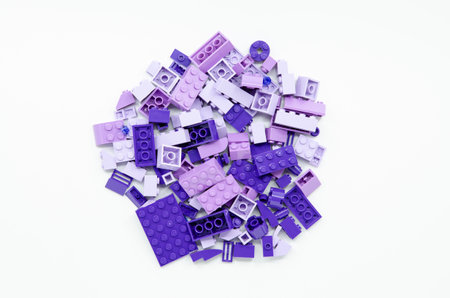 Toy building blocks on a white background. Top view. Copy space.
