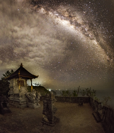 Milkyway over temple located at top of kelingking beach, Nusa Penida Baliの写真素材