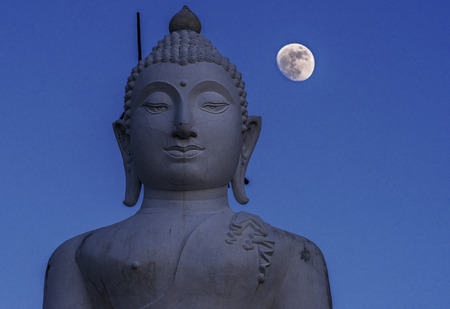 Buddha and full moon, Thailandの写真素材
