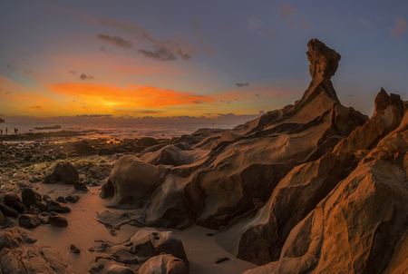 Beautiful rocky Tindakon beach sunset view in Kudat Malaysiaの写真素材