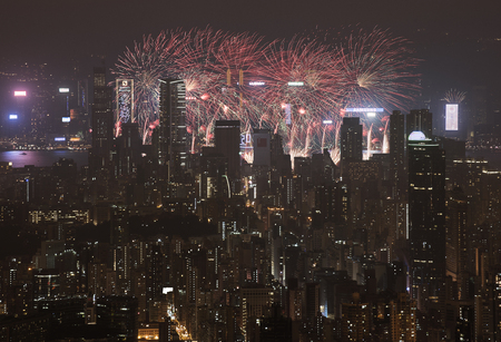 HONG KONG 2017: Hong Hong people welcoming new year by displaying fireworks over their buildingsのeditorial素材
