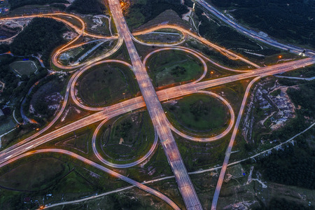 Kuala Lumpur city highway intersection aerial view at sunset, Malaysia