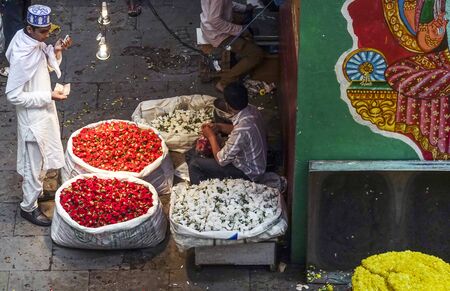 People selling Fresh flowers in wholesale inside KR flower market India which is one of the biggest...