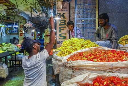 People selling Fresh flowers in wholesale inside KR flower market India which is one of the biggest...