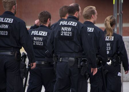 Cologne, North Rhine-Westphalia, Germany - June 12, 2016: Policemen patrolling near Cologne Cathedral and Hauptbahnhof.のeditorial素材