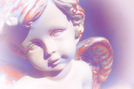Face of Cupid sculptureの写真素材