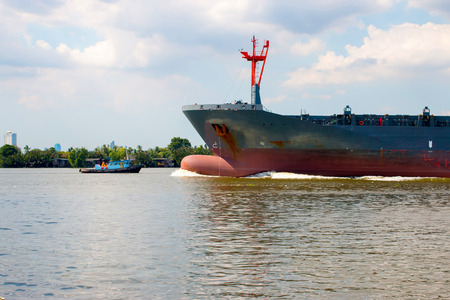Cargo ship in Chaophraya River at Klongtoey portのeditorial素材