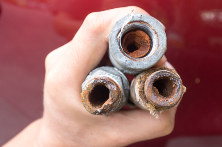 Embolism: A pipe clogged with sediment rust