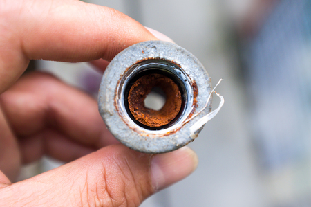 Embolism: A pipe clogged with sediment rust