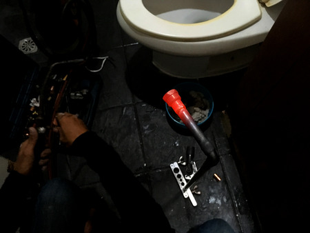 Soldering copper pipe to repairing a hot water copper pipe.の写真素材