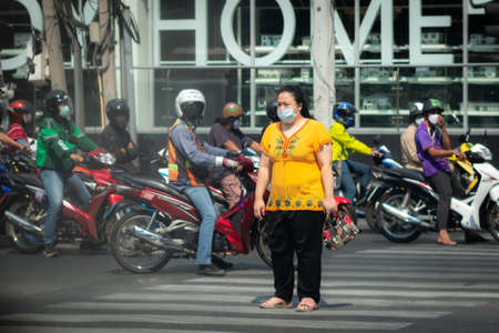 Bangkok, Thailand - March 29 2020: Daily life on street in Bangkok downtown after shutdown and lockdown Bangkok city due to coronavirus disease COVID-19 pandemicのeditorial素材