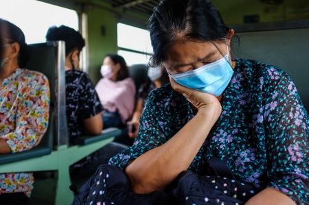 OCTOBER 10, 2020, THAILAND: 
Thai train passengers wearing masks while traveling to other provinces.のeditorial素材